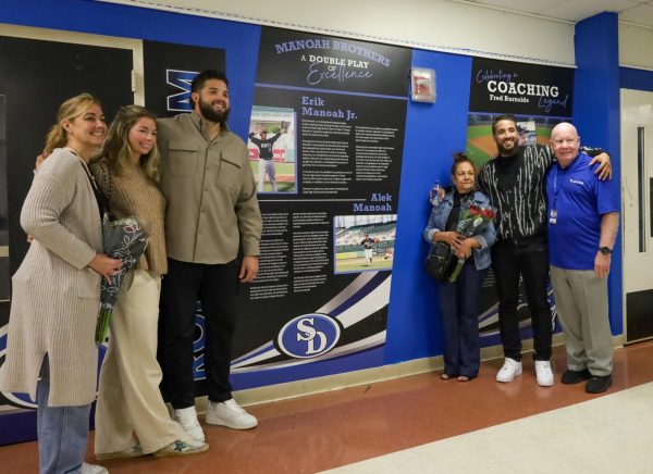 Principals for the Day Erik and Alek Manoah were joined by their mom Susie, Aleks wife Marialena and Coach Burnside and his wife Josie at the unveiling of their banners in the Javier Perez Concourse of Champions