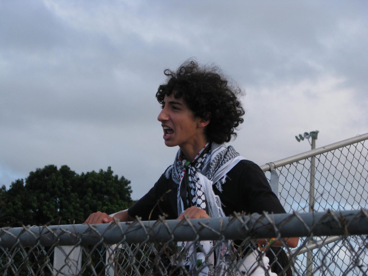 At the girls soccer game vs. Ferguson, Younes cheers on the Lady Bucs. 