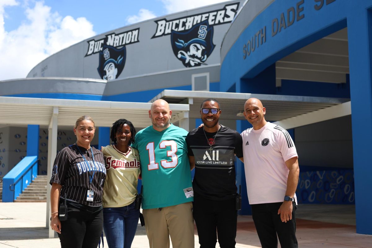 New Principal Jonathan Britton (center) flanked by new assistant principals Shandra Colzie and Kenney Cenat and returning administrators, Vivian Lugo and Michael Vergara during Spririt Week's 'Jersey Day'