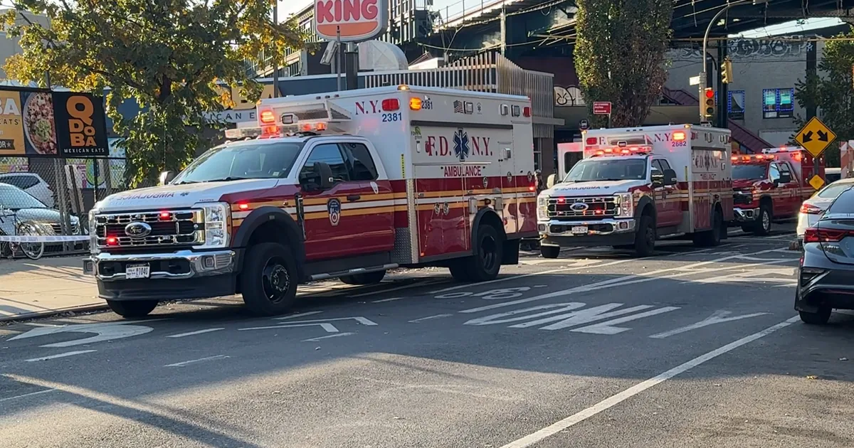 Police and emergency crews respond after a sedan struck pedestrians near a trunk-or-treat event in Brooklyn